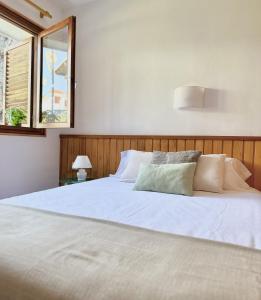 Postel nebo postele na pokoji v ubytování Casa mar y jardín tranquilidad y vistas únicas