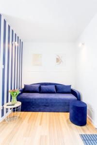 Posedenie v ubytovaní Apartament 12B Niebieskie Apartamenty Poddąbie dawniej Blue Marine z basenem krytym, odkrytym, salą zabaw, animacjami