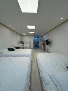 Letto o letti in una camera di Hongdae sub 1min