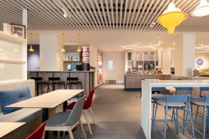 Restaurace v ubytování Holiday Inn Express & Suites Ghent by IHG