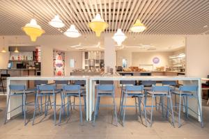 Restaurace v ubytování Holiday Inn Express & Suites Ghent by IHG