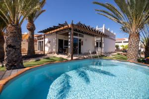 Πισίνα στο ή κοντά στο Casa Las Palmeras