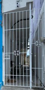 an iron gate in front of a building at Departamento PLAYA GRIS in Ciudad del Carmen