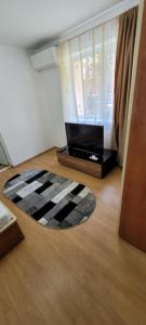 TV a/nebo společenská místnost v ubytování ANDI 1 Apartament