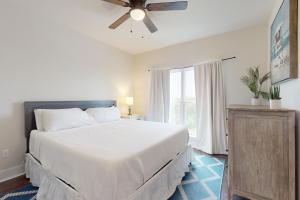 Postel nebo postele na pokoji v ubytování Lionfish + 18 fotografií