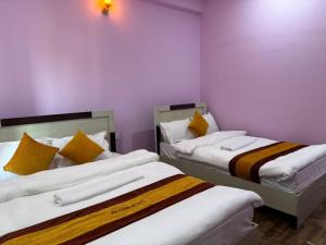 Postel nebo postele na pokoji v ubytování Amazon Resort