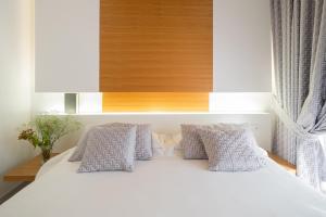 Postel nebo postele na pokoji v ubytování Precise House Montaperti Siena