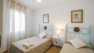 Posteľ alebo postele v izbe v ubytovaní Villa Juana Adra by Ruralidays