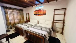 Postel nebo postele na pokoji v ubytování Nuwara Eliya Holiday Home