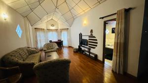 Posezení v ubytování Nuwara Eliya Holiday Home