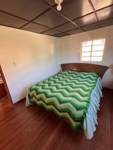 En eller flere senge i et værelse på Aire Puro, Descanso cerca a Bta