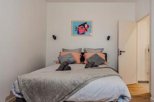 Ένα ή περισσότερα κρεβάτια σε δωμάτιο στο GuestReady - Charming Stay near Paris