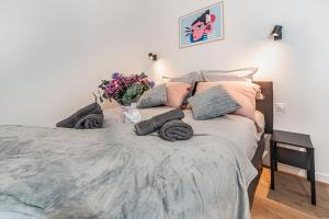 Ένα ή περισσότερα κρεβάτια σε δωμάτιο στο GuestReady - Charming Stay near Paris