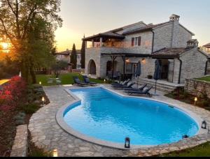 Bazén v ubytování Villa Barbarella nebo v jeho okolí