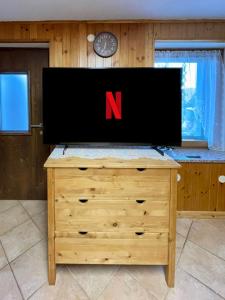 TV a/nebo společenská místnost v ubytování Chalet Vista Montagna - Silenzio Verde e Natura