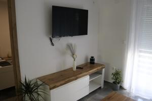 TV a/nebo společenská místnost v ubytování Guest House Neno
