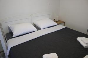 Postel nebo postele na pokoji v ubytování Guest House Neno