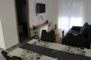 TV a/nebo společenská místnost v ubytování Guest House Neno
