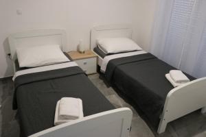 Postel nebo postele na pokoji v ubytování Guest House Neno