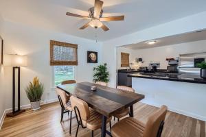 a kitchen and dining room with a table and chairs at Authentic Austin Pad with Roof-top Deck Bar in Austin