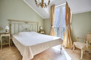 Ένα ή περισσότερα κρεβάτια σε δωμάτιο στο Majestic Vista Apartment