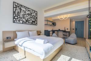 Postel nebo postele na pokoji v ubytování Anoor Studios & Apartments in Gemmayze