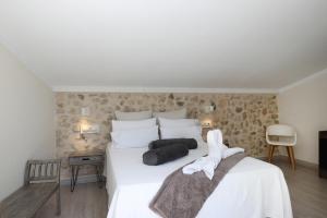 Postel nebo postele na pokoji v ubytování Nasilvana Hotel & Spa Adults Only