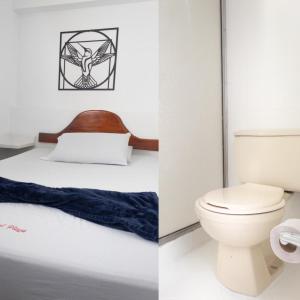 Postel nebo postele na pokoji v ubytování Hotel Playa Sur