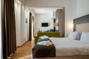 Voodi või voodid majutusasutuse NSM Hotel Palace Lucera toas
