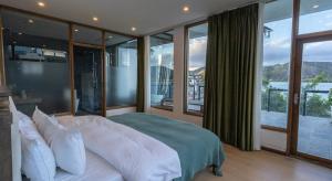 Dali Muhai Island Designer Seaview Manor 객실 침대