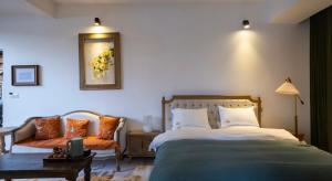 Dali Muhai Island Designer Seaview Manor 객실 침대