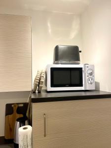 Køkken eller tekøkken på Aurora Stay - Cozy studio apartment + 5 billeder