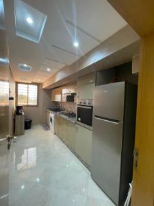 Η κουζίνα ή μικρή κουζίνα στο Duplex luxe in Agadir