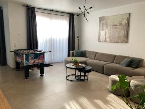 Posezení v ubytování Vakantiehuis En Passant