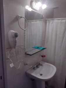 Un baño de Hotel Barracuda