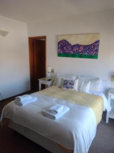 Una cama o camas en una habitación de Hotel Barracuda