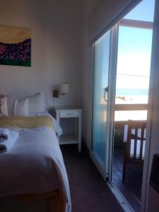Una cama o camas en una habitación de Hotel Barracuda