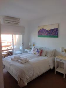 Una cama o camas en una habitación de Hotel Barracuda