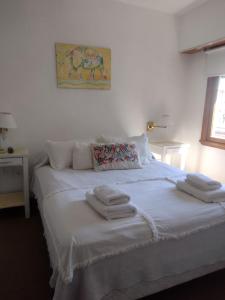 Una cama o camas en una habitación de Hotel Barracuda