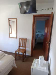 Una cama o camas en una habitación de Hotel Barracuda