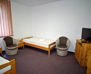 TV a/nebo společenská místnost v ubytování Villa Silver Green