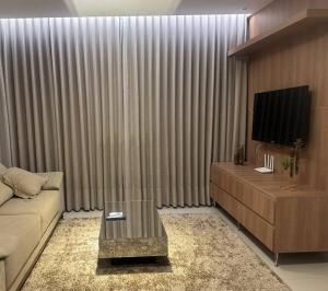flat com portaria 24hsにあるテレビまたはエンターテインメントセンター