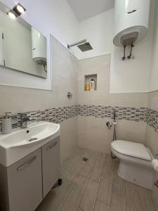 Koupelna v ubytování Incantevole Suite sul Mare