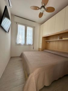 Postel nebo postele na pokoji v ubytování Incantevole Suite sul Mare