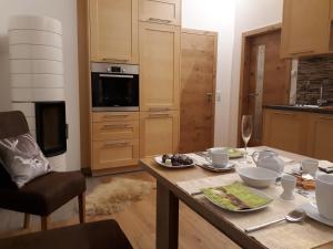 Kuchyň nebo kuchyňský kout v ubytování Apartchalet Sisi- including Saalfelden Leogang Card