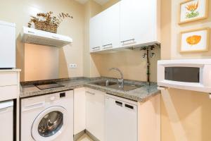 Η κουζίνα ή μικρή κουζίνα στο Veoapartment Alhóndiga Bajo
