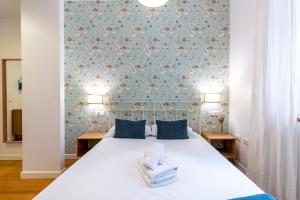 Ένα ή περισσότερα κρεβάτια σε δωμάτιο στο Veoapartment Alhóndiga Bajo