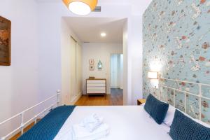 Posteľ alebo postele v izbe v ubytovaní Veoapartment Alhóndiga Bajo
