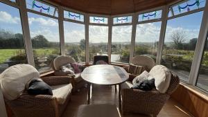 Predel za sedenje v nastanitvi Scartagh House, Scartagh, Clonakilty
