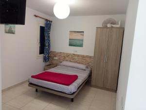Posteľ alebo postele v izbe v ubytovaní Alojamientos playa Centro Corralejo 4